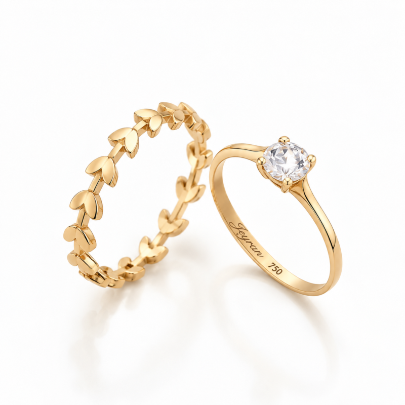 1. ramuna-18k-gold-diamond-ring-model-2.jpg 1. انگشتر طلا ۱۸ عیار رامونا با یک نگین الماس برلیان روی زمینه سفید